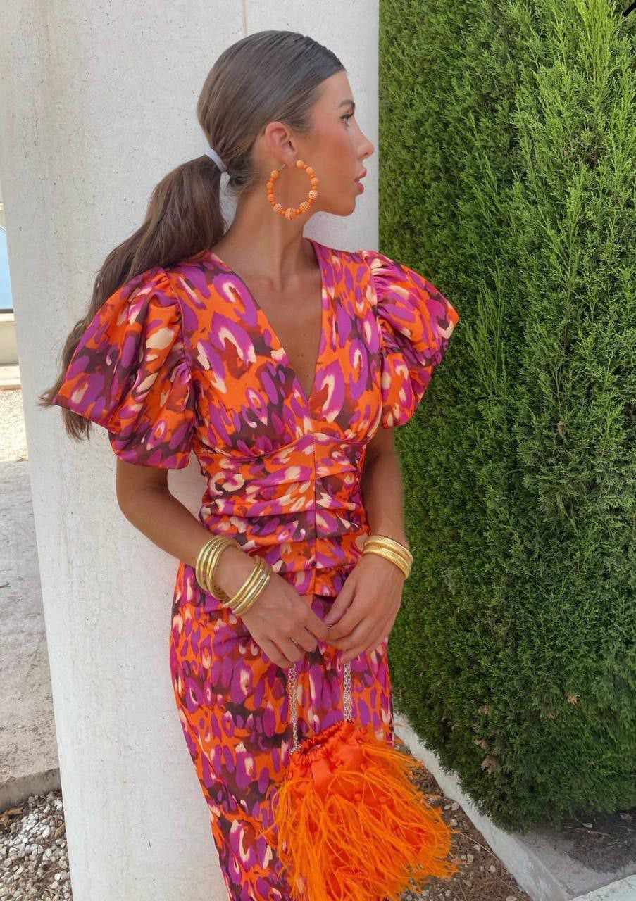 Damen Kleid mit Puffärmeln und Ausschnitt | Midi